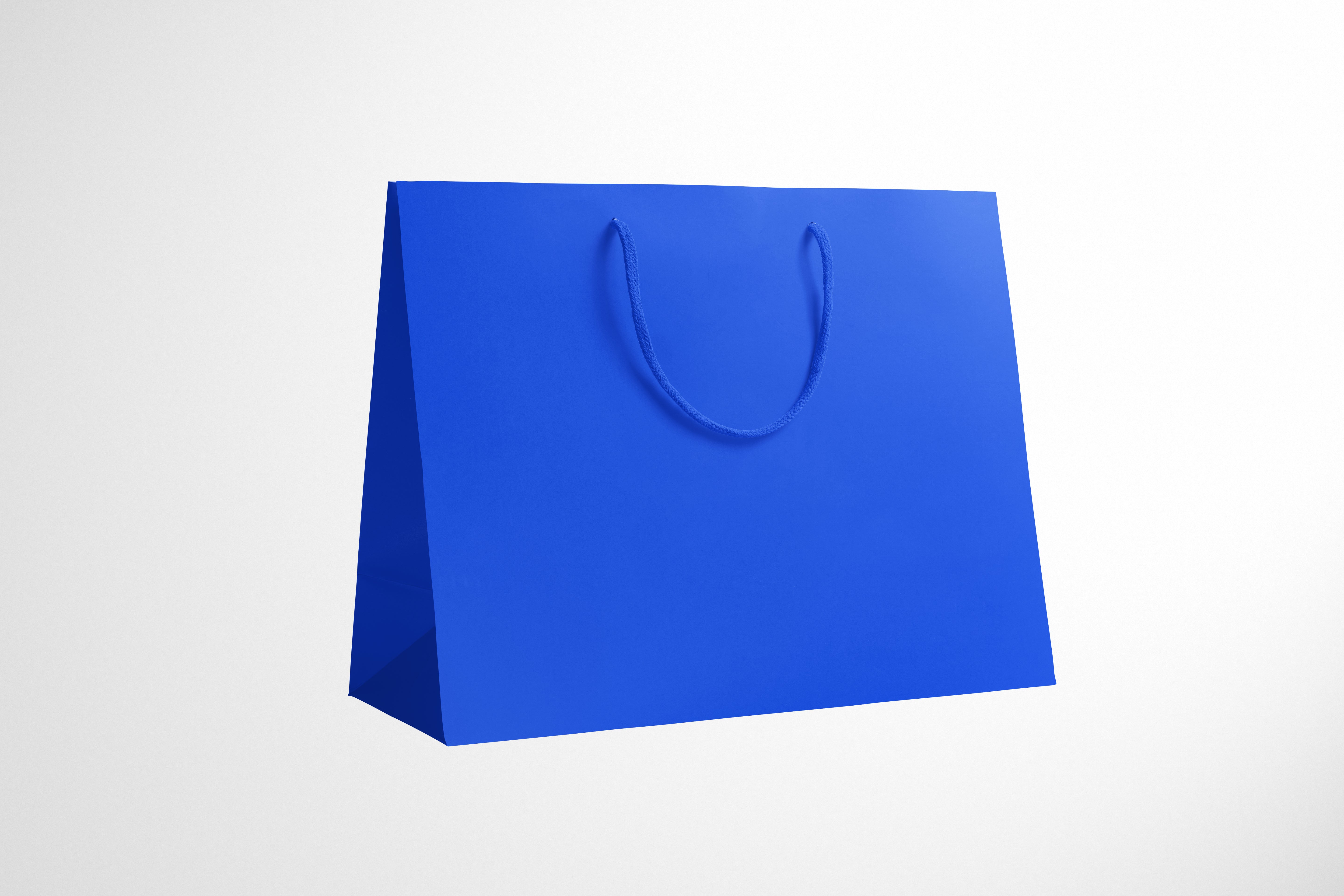 Custom luxury paper bags for retail packaging with premium finish for high-end brands.