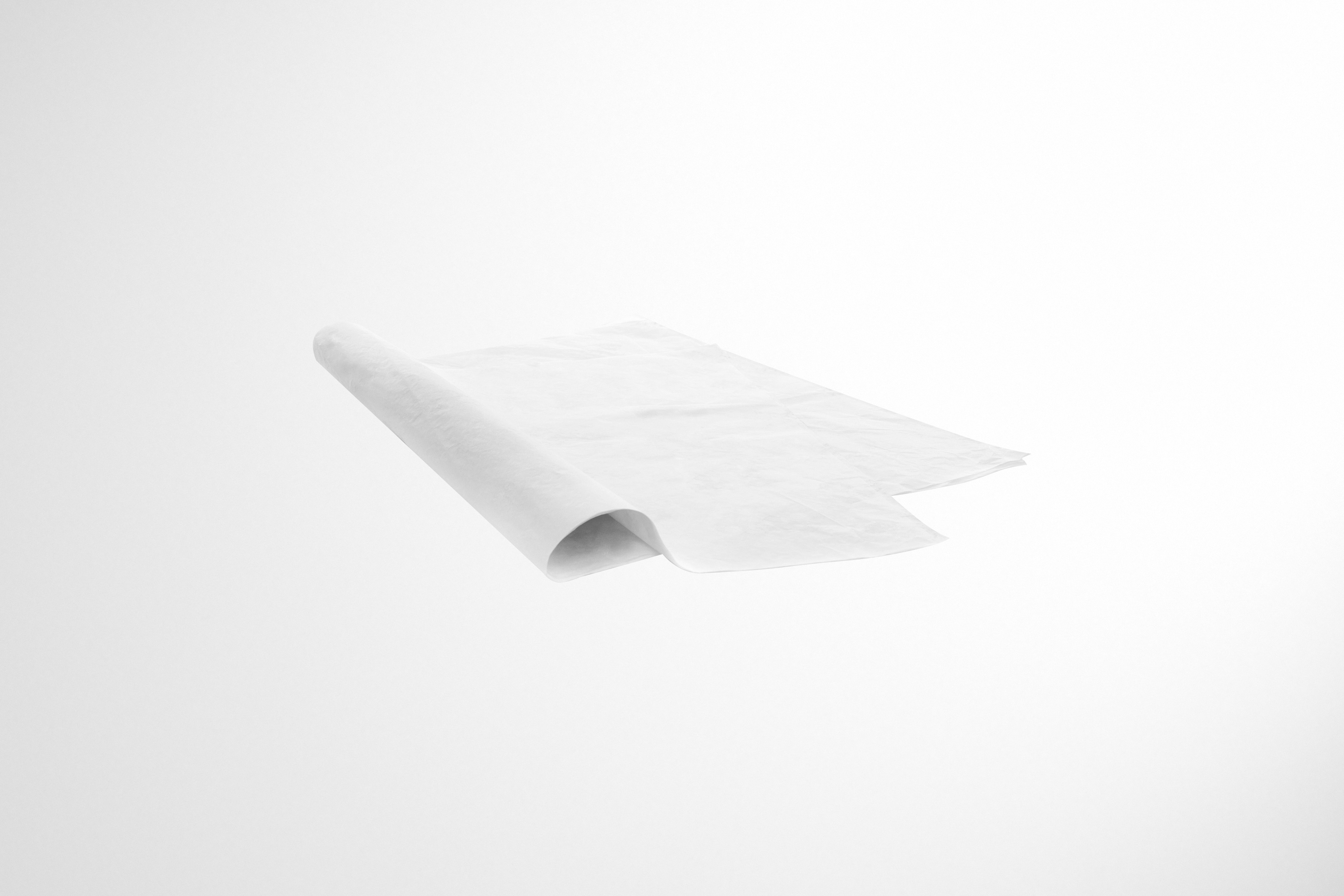 Custom branded tissue paper for retail packaging, adding a premium touch to your products.